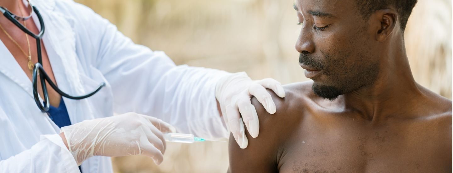 Doctor administering a vaccine